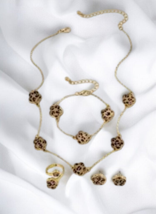 Parure 4 bijoux doré et léopard motif fleurs