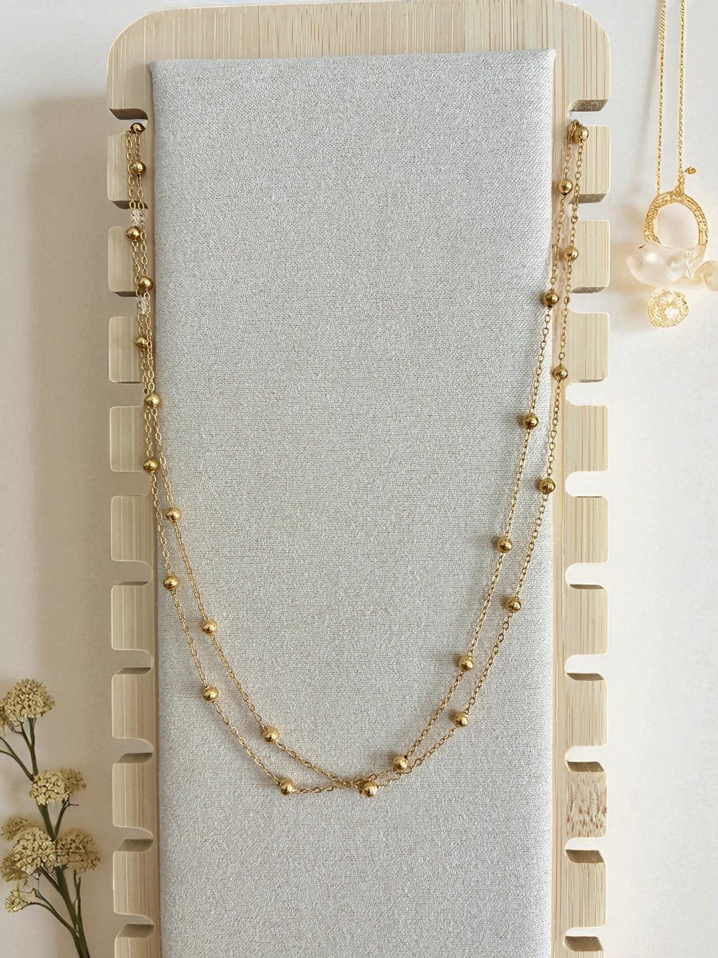 Collier double rang doré et perles