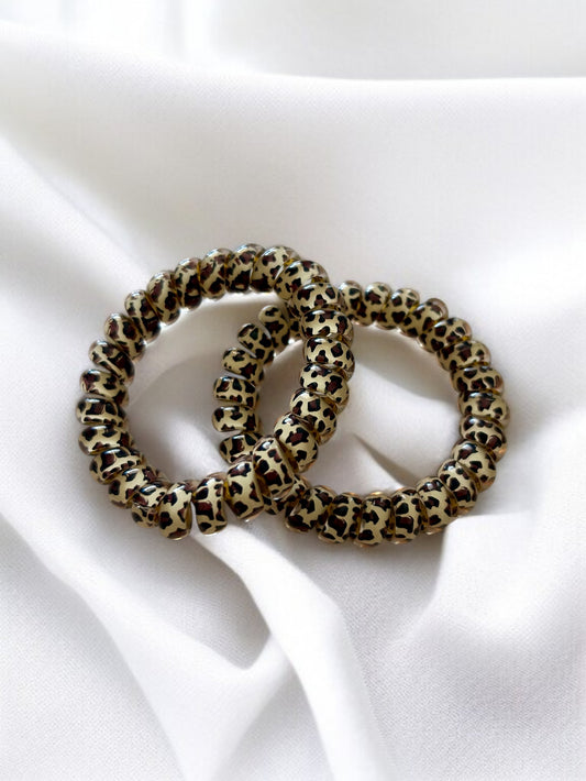 Lot de 2 élastiques en spirale motif léopard