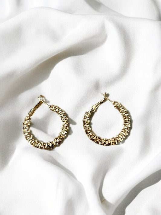 Boucles d’oreilles créoles dorées