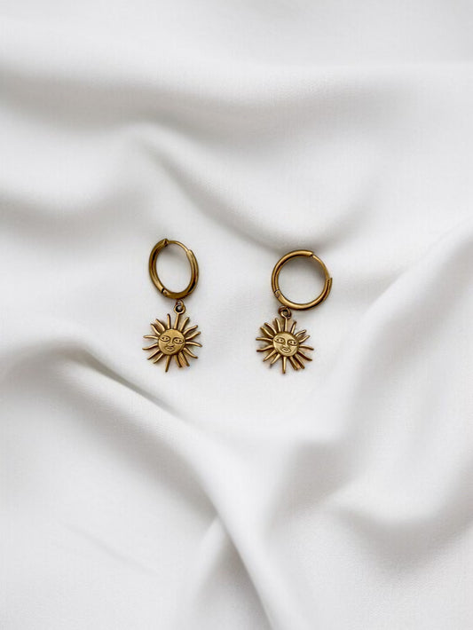 Boucles d'oreilles créoles pendantes dorées et soleil