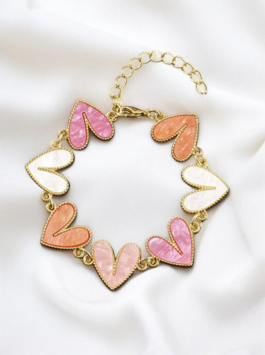Bracelet doré et cœur orange rose et blanc