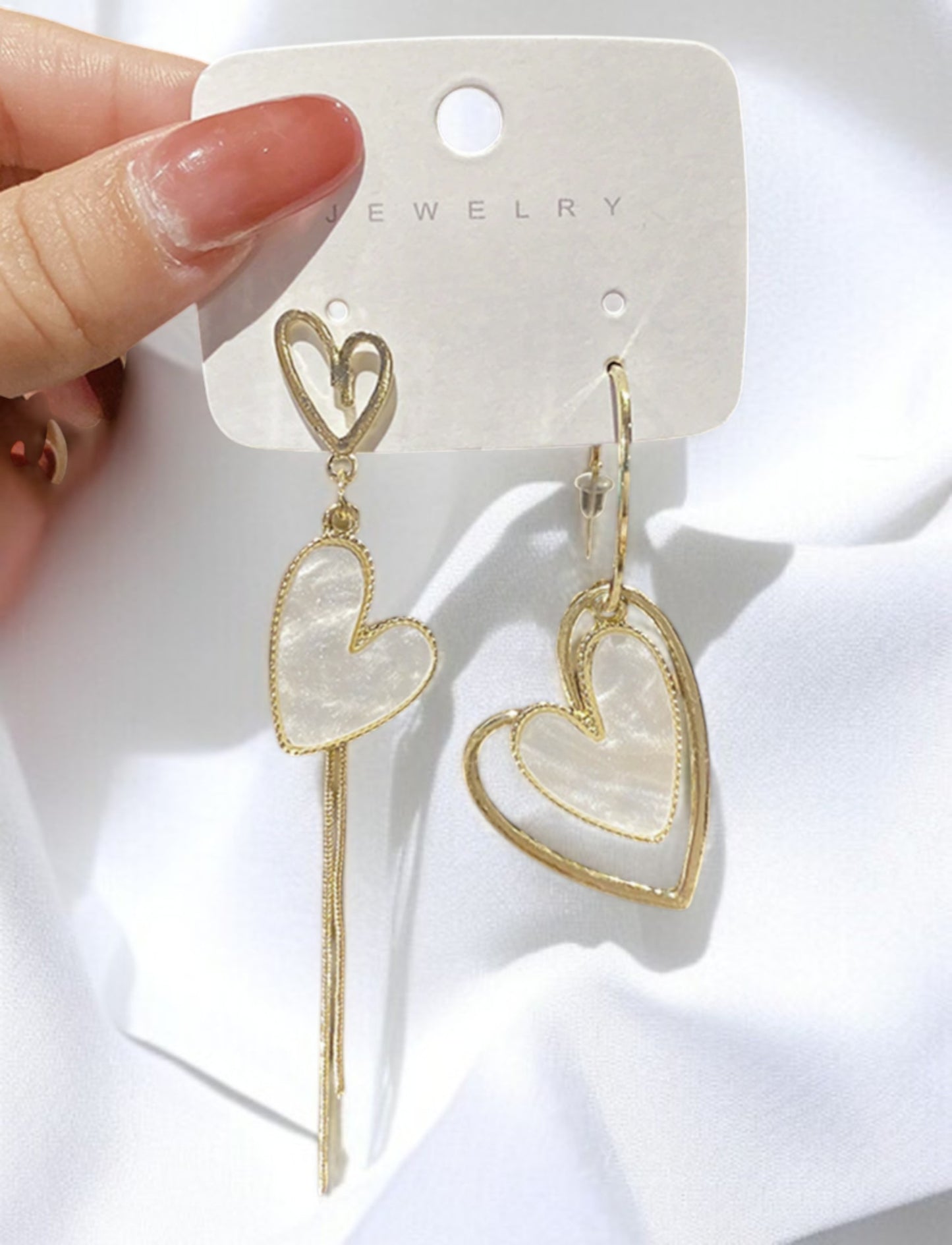 Boucles d’oreilles cœur asymétriques dorées