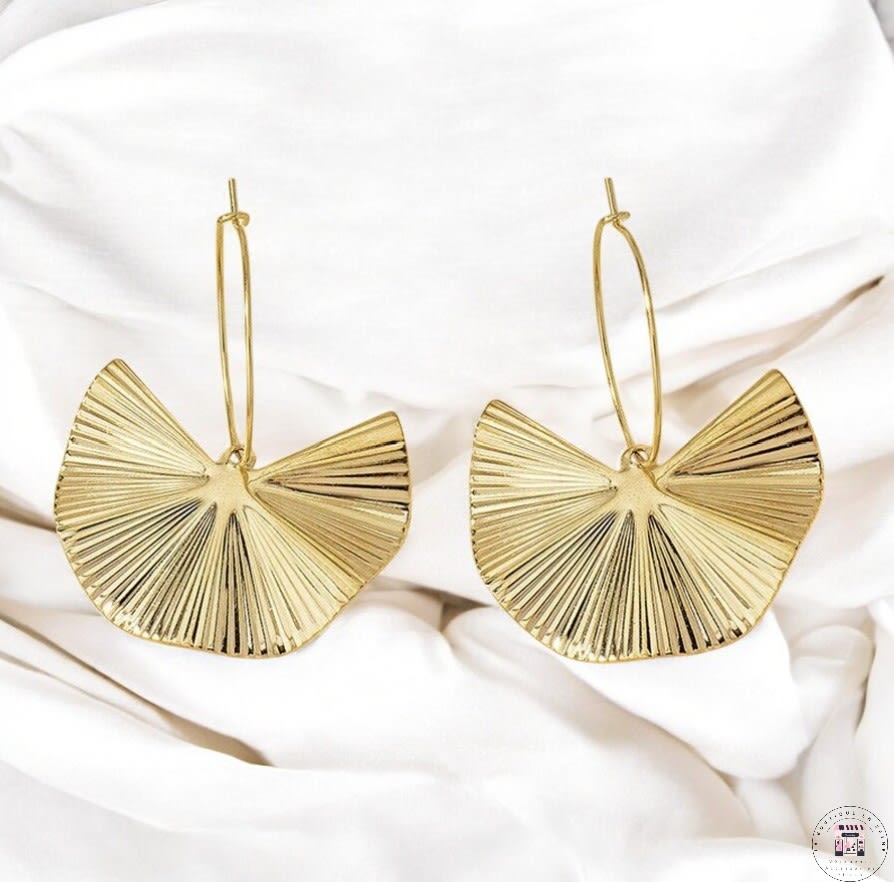 Boucles d'oreilles créoles pendantes à feuilles dorées et striées