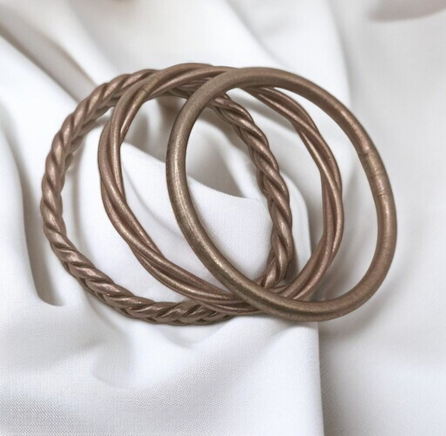 Lot de 3 Bracelets joncs tressés silicone doré / rose gold
